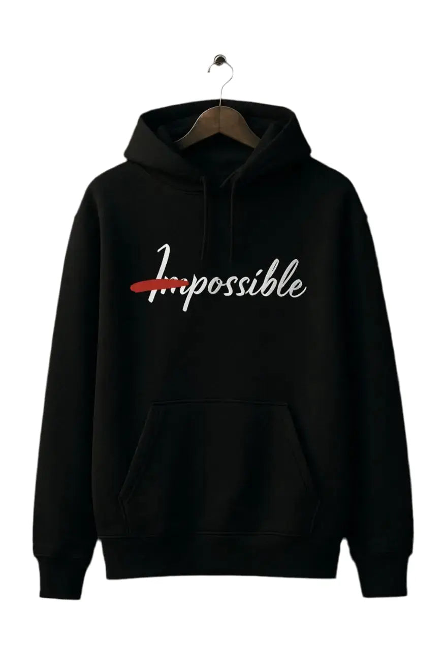 Sweat à capuche noir avec inscription “Impossible” en blanc, barrée en rouge, style streetwear unisexe.