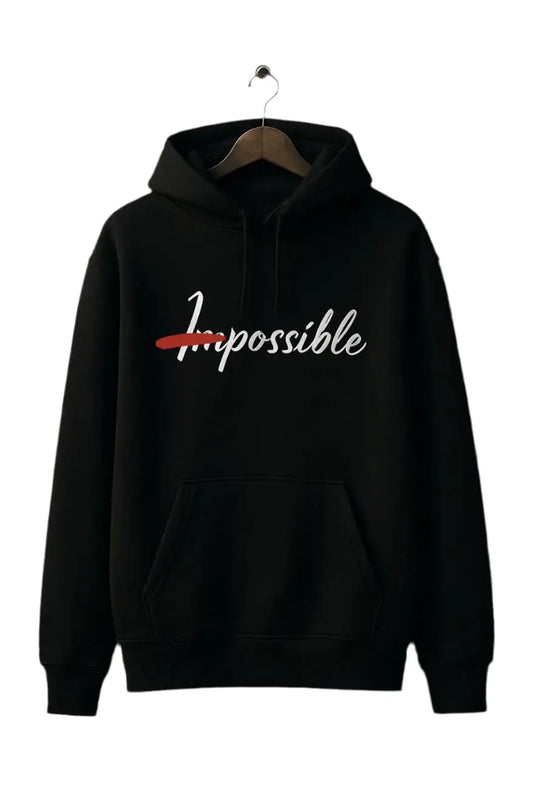Sweat à capuche noir avec inscription “Impossible” en blanc, barrée en rouge, style streetwear unisexe.